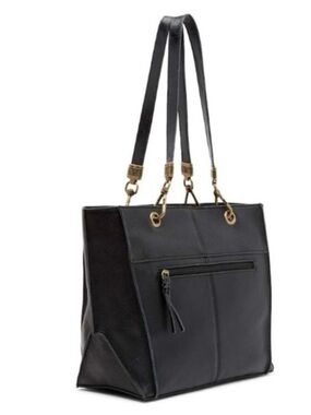 The Sak Classic Black Leather Tote with Front Zip Pockets.